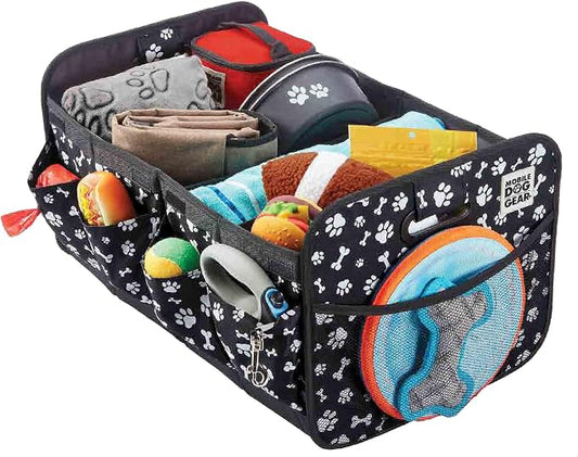 Mobile Dog Gear, Dogssentials Collapsible Storage Organizer for Travel with Built-in Waste Bag Dispenser, Includes 1 Roll of Waste Bags, Black/White Paw Bone Print, Meets Airline Regulations by MobileDogGear